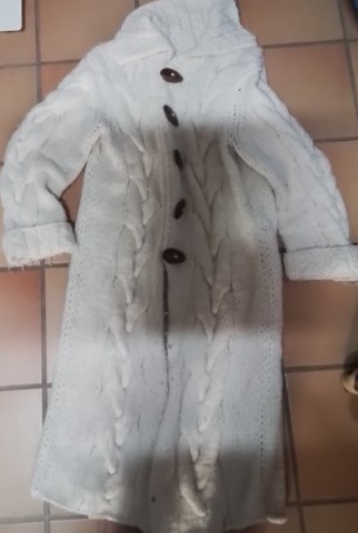 Wollmantel mit Zopf